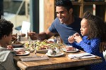 Family sit down meal